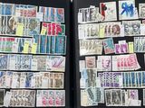 many different types of stamps on the pages of a book