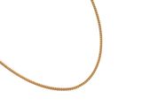 a close up of a gold chain on a white background