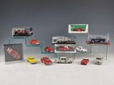 a lot of toy cars that are in a display case