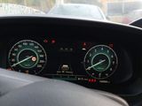 a close up of the dashboard of a car with the gauges on