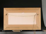 a picture of an empty picture frame on a shelf