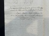a piece of paper with writing on it on a table