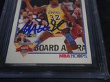 an autographed card of a basketball player in a yellow uniform