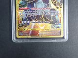 a close up of a pokemon card in a plastic case