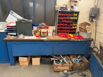 a workbench with a lot of tools on it