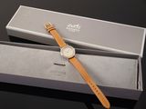an image of a watch in a box on a table