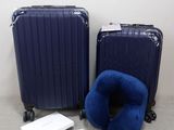deux bagages posés l'un à côté de l'autre