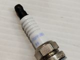 a close up of a spark spark on a white surface