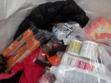 a plastic bag filled with various items that are in it