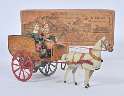 a toy horse pulling a carriage with two people in it