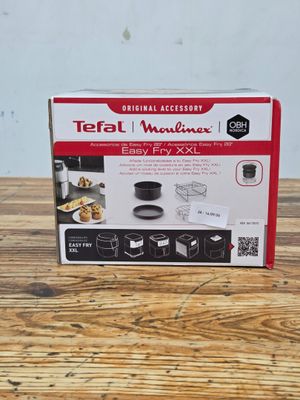 the box is open on a wooden table with the contents in it