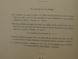 an old book with a black and white picture on it
