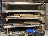 a lot of shelves that are in a warehouse