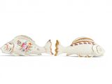 pair of fish shaped porcelain figurines with floral decoration