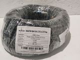 a coil of black wire wrapped in plastic on a table