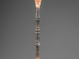an image of a glass vase with a diamond on it