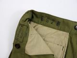 an image of a close up of a pair of green pants