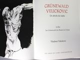 un livre ouvert sur lequel figure le dessin d'un homme
