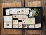 a tray of soaps that are on a table