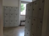 many lockers in the hallway of a building