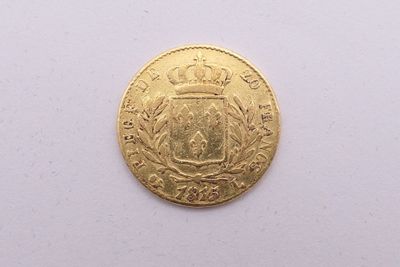 l'image d'une pièce d'or ornée d'une couronne