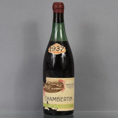 a close up of a bottle of wine on a table