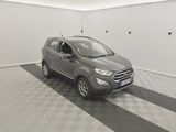 the grey car is parked in the garage on the checkered floor