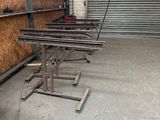 several tables in a room with a lot of wood