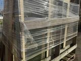a pallet that has some plastic wrapped around it