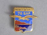 a close up of a badge on a white surface