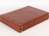 brown leather suitcase on a white background