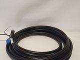 a close up of a black hose on a white surface