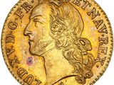 une pièce d'or ornée d'une tête de femme