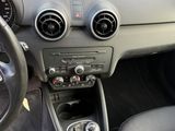 the interior of a car with a steering wheel, dashboard, and dashboard controls
