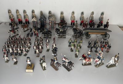 many figurines of soldiers on display on a table