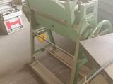 a picture of a machine in a factory with a lot of tools