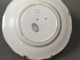 a white plate with a black and white design on it