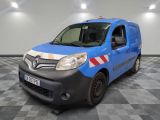 the blue van is parked on a checkered floor in the garage