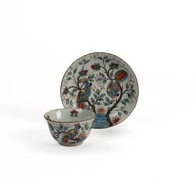 an image of a cup and saucer sitting on top of a white table