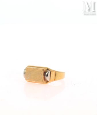 an image of a gold ring with a stone in the middle