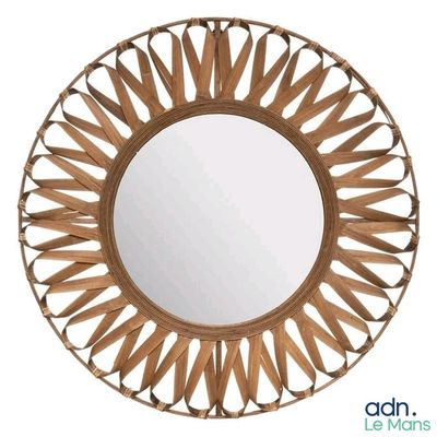 un miroir rond en bois avec un cadre en métal