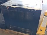 an image of a box of old appliances in a warehouse