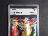 a close up of a pokemon card in a plastic case