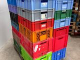 several crates stacked on top of each other in a warehouse