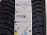 a close up of a tire on a white background with a price tag