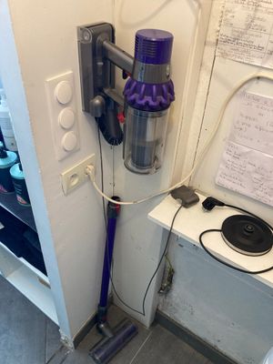 a vacuum that is sitting on a counter next to a door