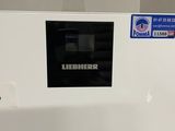 a picture of a white refrigerator in a kitchen
