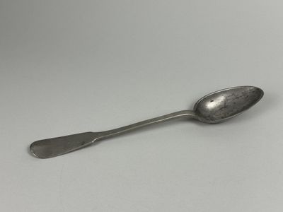 a spoon that is sitting on a table
