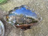 a glass plate with a picture of a building on it