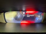 a car dashboard with a digital display on it ' s dashboard